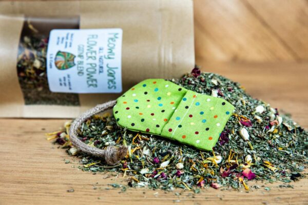 A pile of catnip mixed with flowers with toy