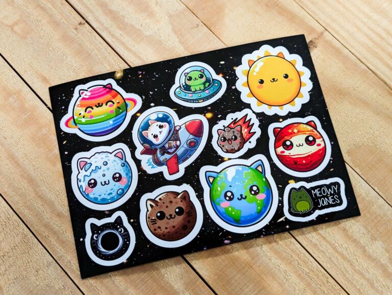 A sheet of stickers of cats that look like planets