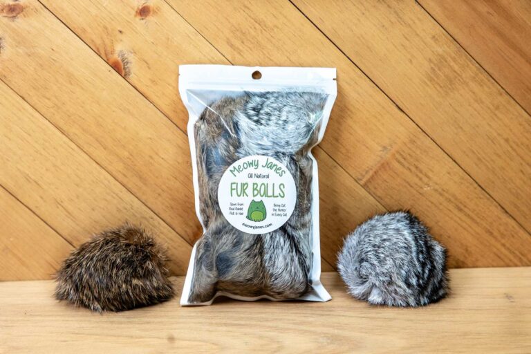 A package of pom pom ball cat toys  made out of rabbit fur. 