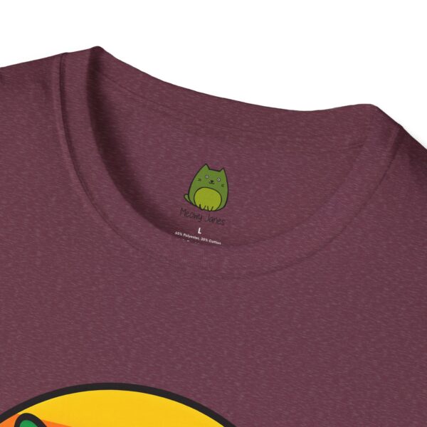 A  burgundy t-shirt with a cat image on the front center. 