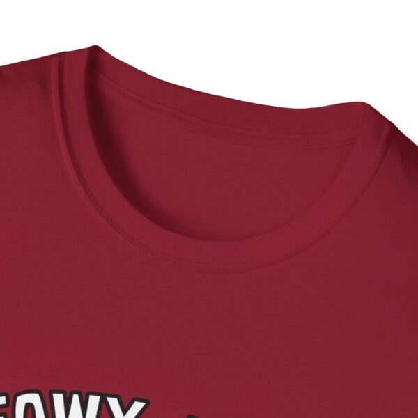 A red t-shirt with a cute green fat in the middle center of it. 