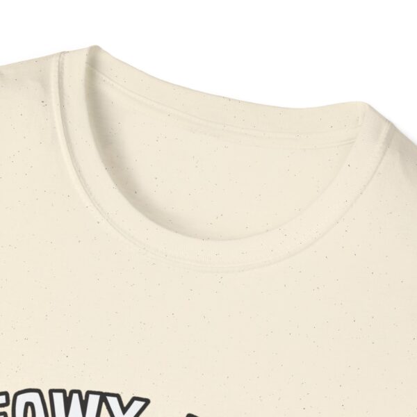 A cream colored t-shirt with a cute green fat in the middle center of it. 